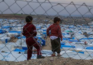 Iraq monk who fled ISIS now obeys God's calling by serving Christians at refugee camp