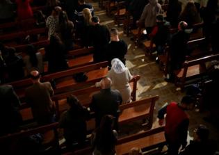 Christians in Baghdad celebrate Christmas in fear after deadly attack