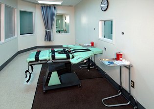 Convicted murderer sings Christian hymns before execution