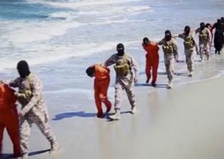Libyan authorities find mass grave containing bodies of 21 Coptic Christians beheaded by ISIS