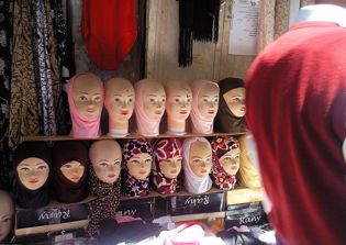 Employers may ban workers from wearing religious symbols, EU court rules