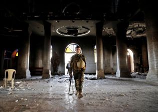 ISIS fighters destroy Christan homes and churches as they lose ground in Mosul
