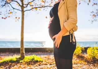 Pregnant teen who was banned by her school from graduation receives diploma in church