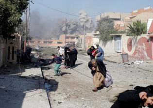 Female ISIS fighter blows herself up while clutching a baby